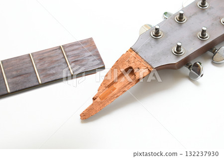 part of broken wood acoustic guitar isolated on white background part of broken wood acoustic guitar isolated on white background 132237930