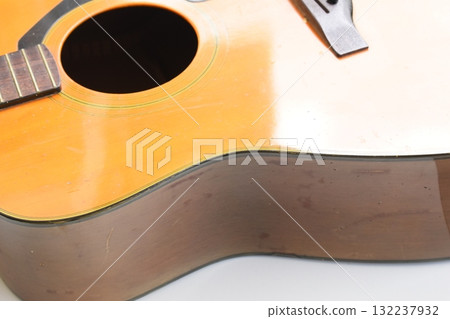 brown wood acoustic guitar isolated on white background 132237932