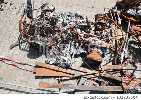 A car is on fire and has been destroyed A car is on fire and has been destroyed 132238504
