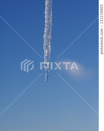 A long icicle hanging from the sky A long icicle hanging from the sky 132238805