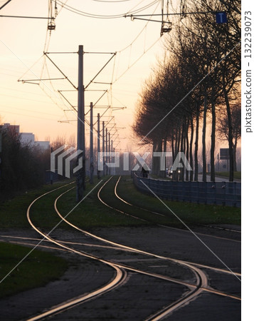 Train track with a person walking on it 132239073