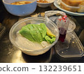 steamed fish with lime and salt in plastic tray 132239651
