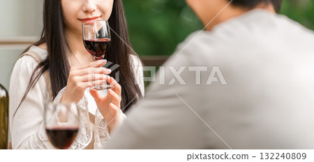 Young Asian men and women, friends, companions, colleagues having a barbecue, home party, glamping on a wooden deck 132240809