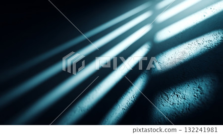 Dramatic Light and Shadow Play from Window on Textured Surface 132241981