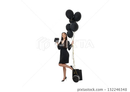 Woman holds shopping bags and black balloons, isolated, PNG 132246348