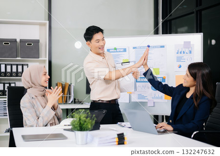 Business team discuss at meeting room. working together with laptop ,tablet and smart phone on desk Financial accountant at office Business team discuss at meeting room. working together with laptop ,tablet and smart phone on desk Financial accountant at office 132247632