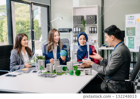 Group of alternative energy engineers discussing a project with a worker businesspeople a meeting in solar cell panel and Solar Energy Environment city 132248013