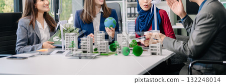 Group of alternative energy engineers discussing a project with a worker businesspeople a meeting in solar cell panel and Solar Energy Environment city 132248014