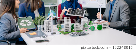 Group of alternative energy engineers discussing a project with a worker businesspeople a meeting in solar cell panel and Solar Energy Environment city 132248015
