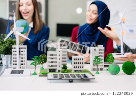 business team people planning and discussing on recycle reduce reuse policy symbol in office meeting room. Green business company and Solar Energy Environment city business team people planning and discussing on recycle reduce reuse policy symbol in office meeting room. Green business company and Solar Energy Environment city 132248029