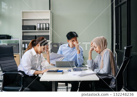 Furious team Asian businesspeople arguing strongly after making a mistake at work in office Furious team Asian businesspeople arguing strongly after making a mistake at work in office 132248236
