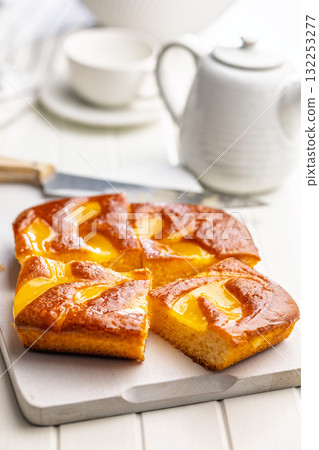 Catalana sponge cake on white table. Catalana sponge cake on white table. 132253277