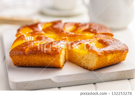 Catalana sponge cake on white table. Catalana sponge cake on white table. 132253278