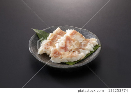 Small intestine grilled meat served on a plate Small intestine grilled meat served on a plate 132253774