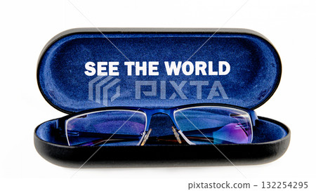 Glasses rest in an elegant case, inviting you to explore and embrace the world. The words See the World inspire a journey filled with wonder and new perspectives 132254295