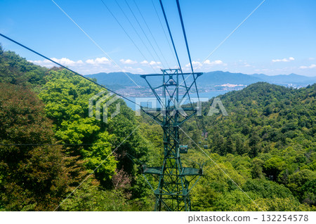 Miyajima ropeway above Mount Misen on Miyajimaa Island, Hiroshima Miyajima ropeway above Mount Misen on Miyajimaa Island, Hiroshima 132254578