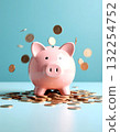 Pink piggy bank surrounded by glittering golden financial coins 132254752