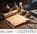 Rolled parchment illuminated by candlelight on wooden table 132254763