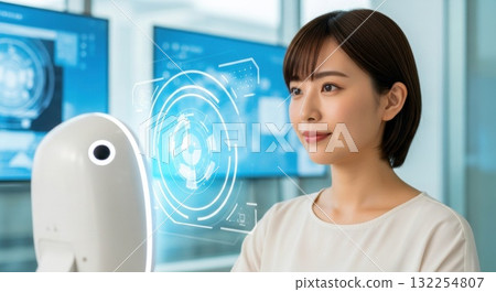 A woman operating a hologram interface 132254807