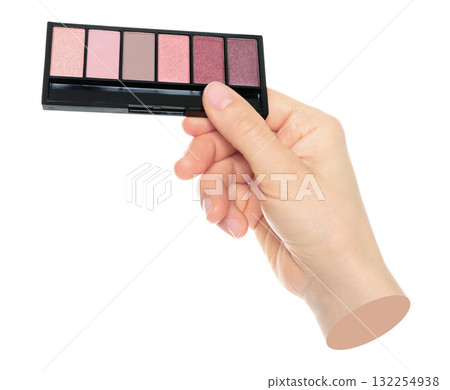Woman hand holds cosmetic palette, isolated on transparent background, cosmetics and visage concept. Contemporary art 132254938