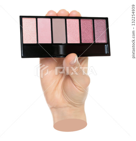 Woman hand holds cosmetic palette, isolated on transparent background, cosmetics and visage concept. Contemporary art 132254939