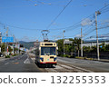 This is a Saden Transportation tram that runs through Kochi city. 132255353