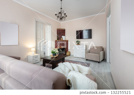 Cozy Living Room with Fireplace and Soft Lighting in Classic Style Cozy Living Room with Fireplace and Soft Lighting in Classic Style 132255521