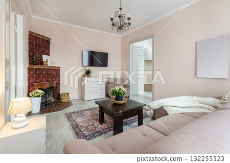 Cozy Living Room with Fireplace and Modern Classic Interior Cozy Living Room with Fireplace and Modern Classic Interior 132255523