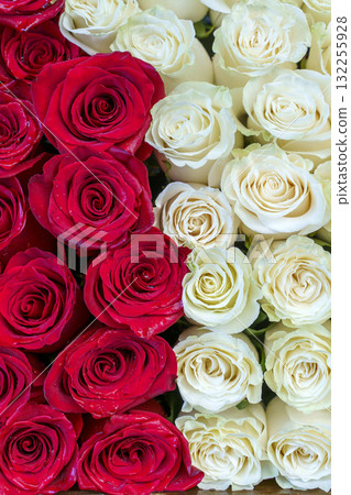 Red and White Roses on Flower Market Table 132255928