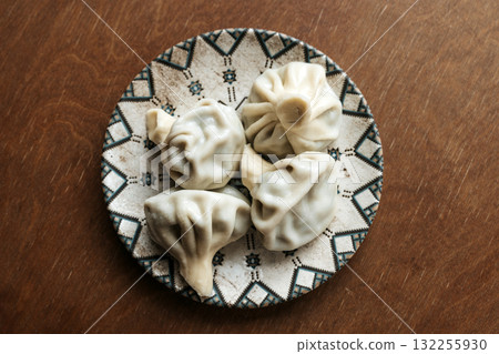 Georgian Khinkali. Traditional Dumplings on Plate Georgian Khinkali. Traditional Dumplings on Plate 132255930