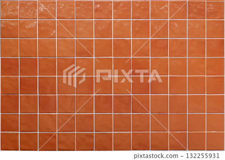 Orange ceramic tile background. Old vintage ceramic tiles in green to decorate the kitchen or bathroom Orange ceramic tile background. Old vintage ceramic tiles in green to decorate the kitchen or bathroom 132255931