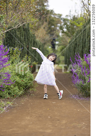 Girls playing in the park Girls playing in the park 132256089