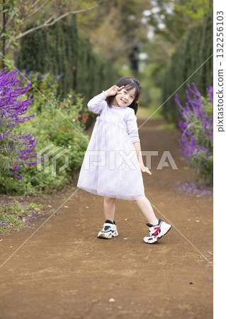 Pretty girls playing in the park Pretty girls playing in the park 132256103