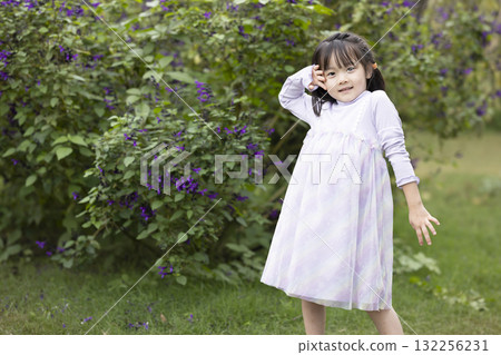 Pretty girls playing in the park Pretty girls playing in the park 132256231