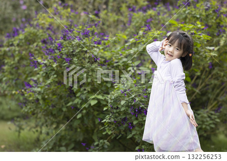 Pretty girls playing in the park Pretty girls playing in the park 132256253