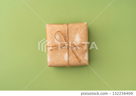 A Christmas gift wrapped in eco-friendly packaging A Christmas gift wrapped in eco-friendly packaging 132256409