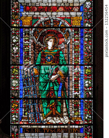 Saint Lawrence of Rome, stained glass window in Santa Maria Novella Principal Dominican church in Florence, Italy Saint Lawrence of Rome, stained glass window in Santa Maria Novella Principal Dominican church in Florence, Italy 132256454