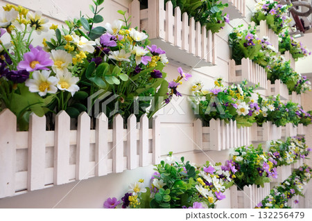 Beautiful colorful flowers pattern on the wall background in Shanghai, China Beautiful colorful flowers pattern on the wall background in Shanghai, China 132256479