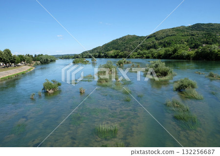 River Una on a summer day in Hrvatska Kostajnica, Croatia River Una on a summer day in Hrvatska Kostajnica, Croatia 132256687