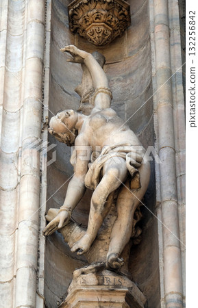 Statue of Saint on the facade of the Milan Cathedral, Duomo di Santa Maria Nascente, Milan, Lombardy, Italy 132256842