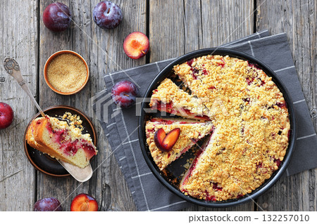 Crumb topped Plum Pie in a baking dish 132257010