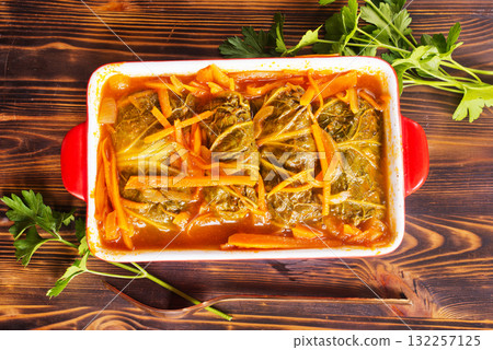 Meatballs with cabbage (golubci) baked in tomato sauce Meatballs with cabbage (golubci) baked in tomato sauce 132257125