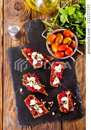 breaqd with beet pesto and cheese 132257151