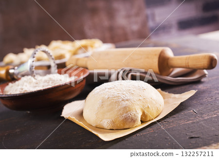 Fresh dough on a board Fresh dough on a board 132257211