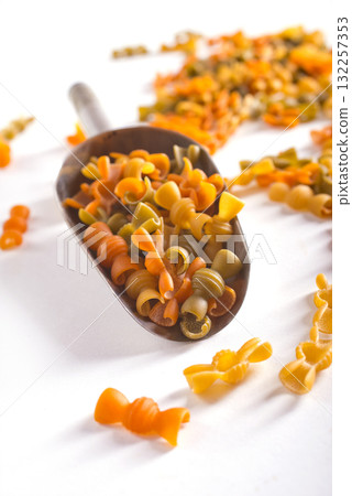 Colorful pasta on light background Colorful pasta on light background 132257353