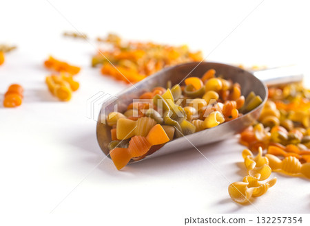 Colorful pasta on light background 132257354