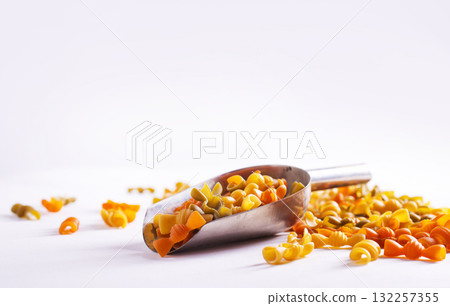 Colorful pasta on light background 132257355