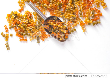 Colorful pasta on light background Colorful pasta on light background 132257358