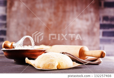 Fresh dough on a board Fresh dough on a board 132257408
