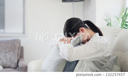 Sad and crying Asian woman 132257457